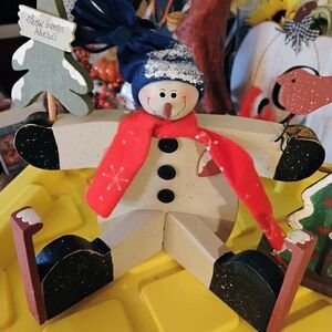 Festive Snowman Decor with Red Scarf and Blue Hat